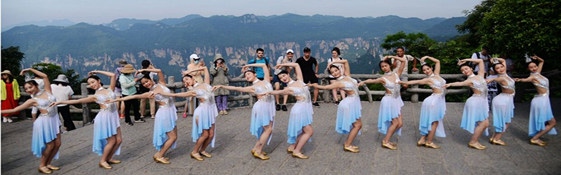 Actresses from Zhangjiajie Romantic Show dance in Tianzi Mountain