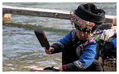 Women washing clothes by Tuojiang River